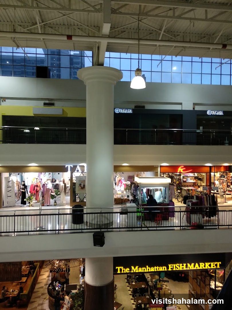 Indoor shopping mall with multiple stores and restaurants