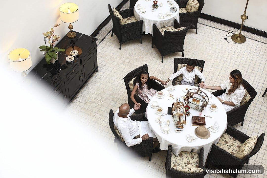 Family enjoying afternoon tea