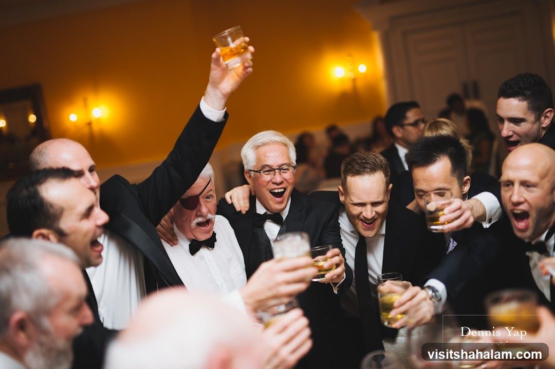 Men celebrating with drinks