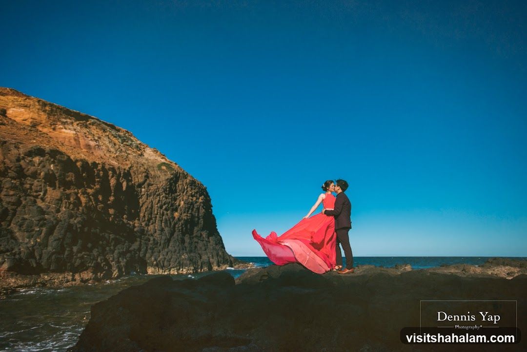 Couple Posing by the Sea