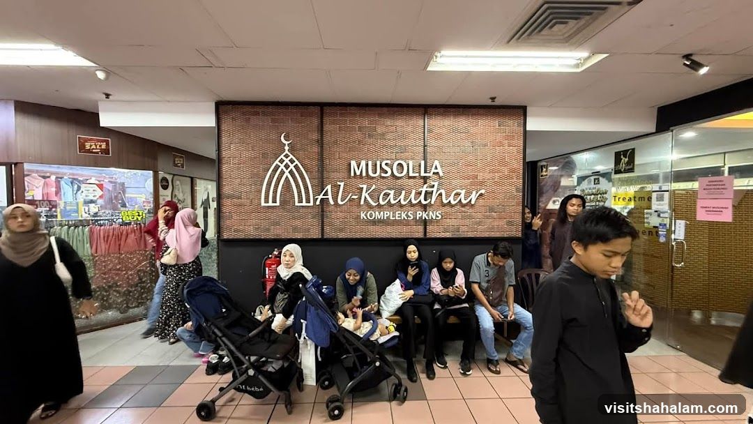 People waiting outside a prayer room