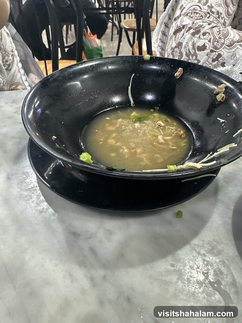 Partially Eaten Bowl of Noodles