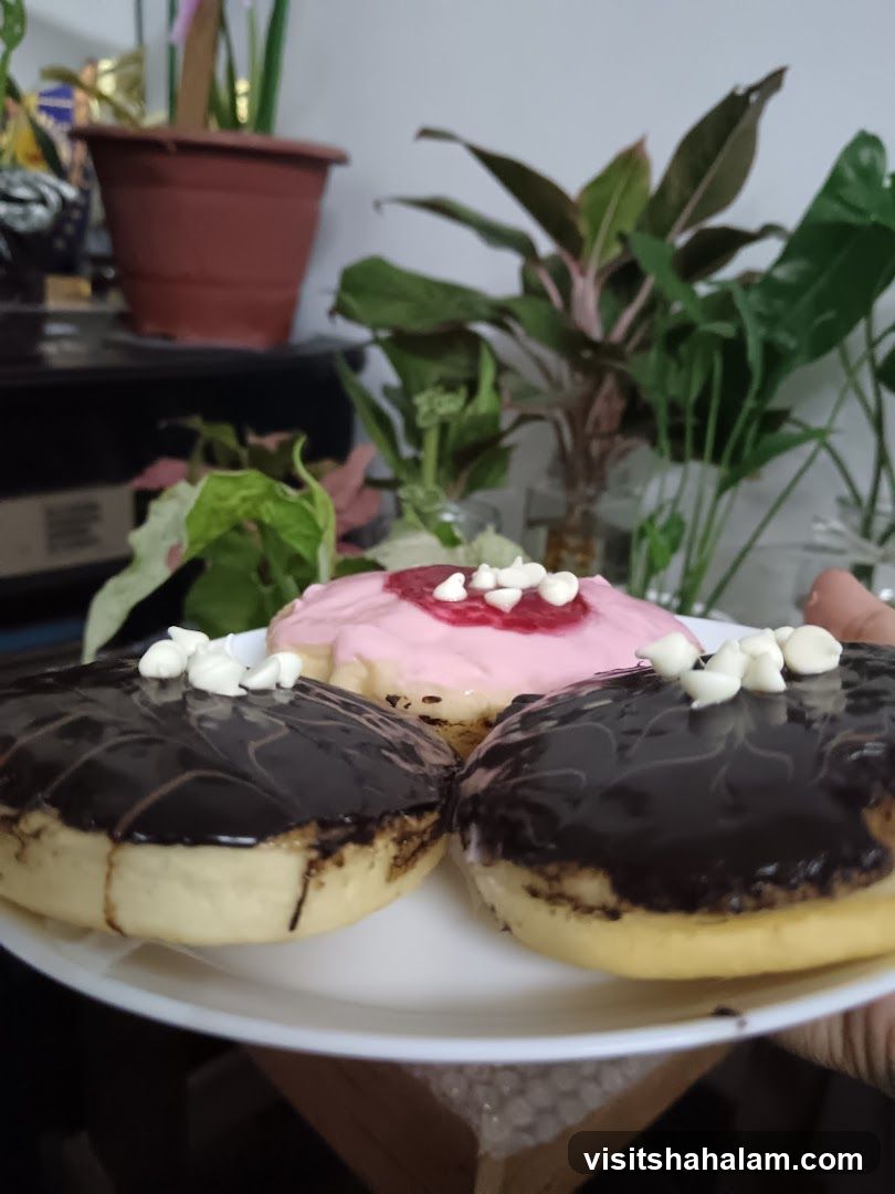 Three Frosted Doughnuts