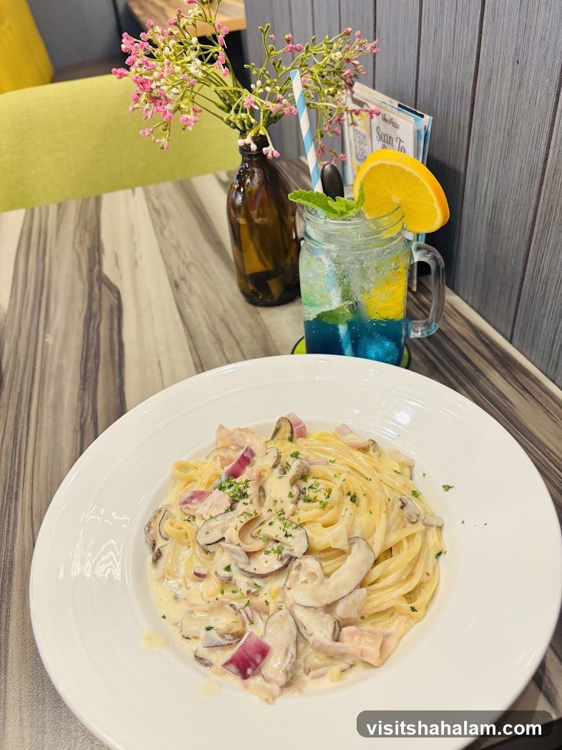 Creamy Mushroom Pasta and Blue Drink