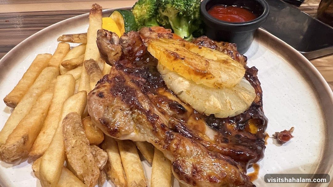 Grilled Pork Chop with Pineapple and Fries