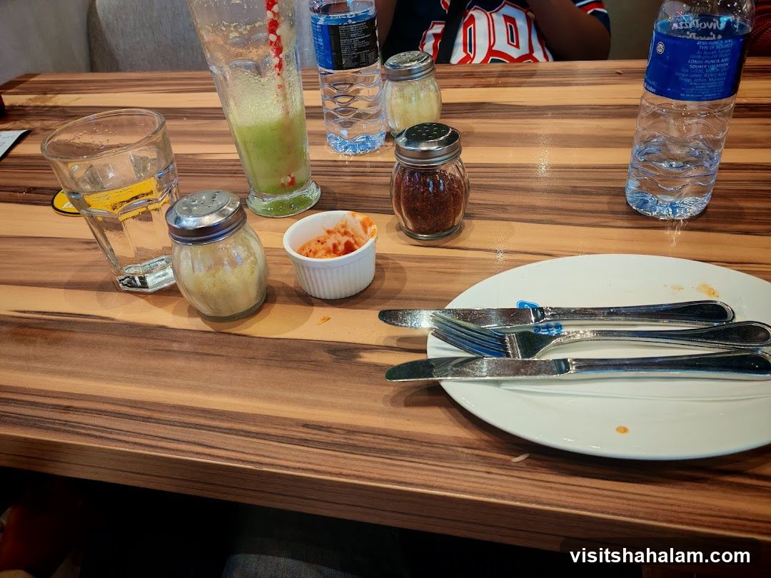 Table Setting with Drinks and Condiments
