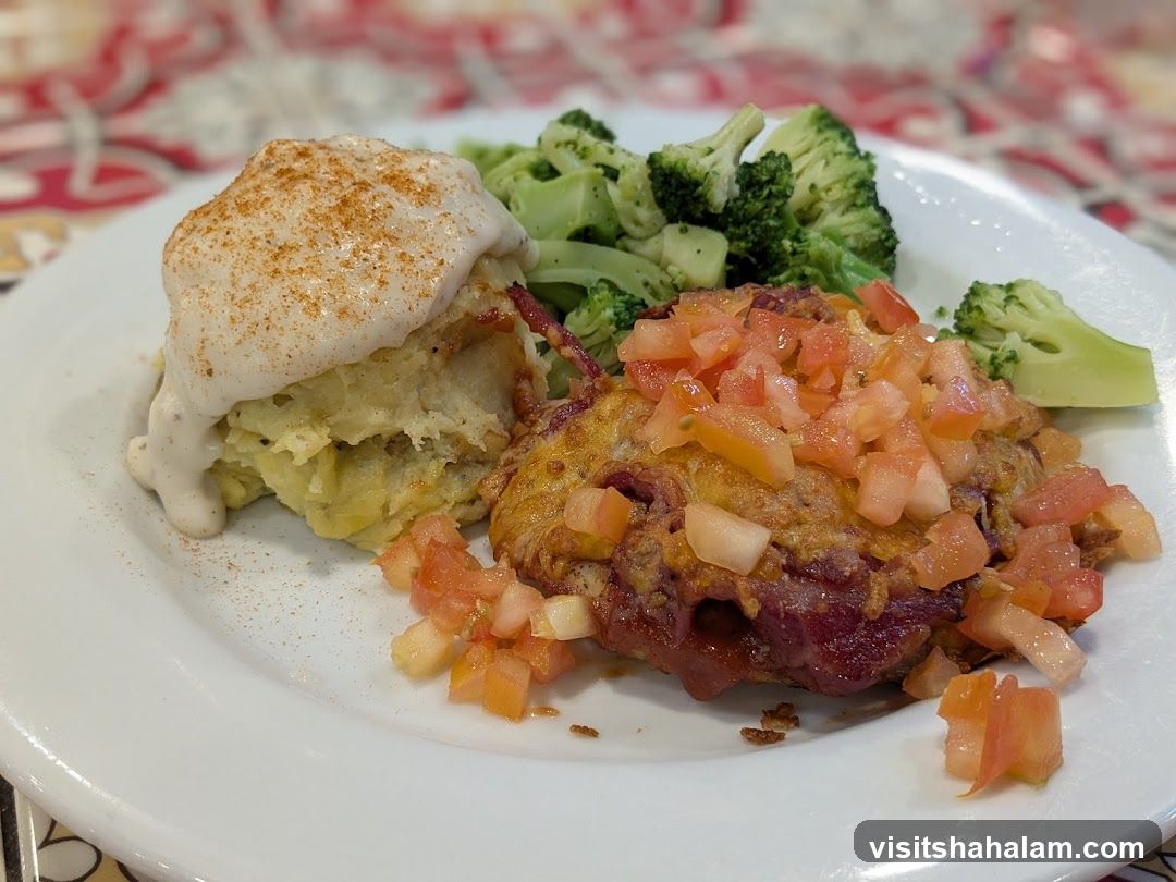 Chicken dish with mashed potatoes and broccoli