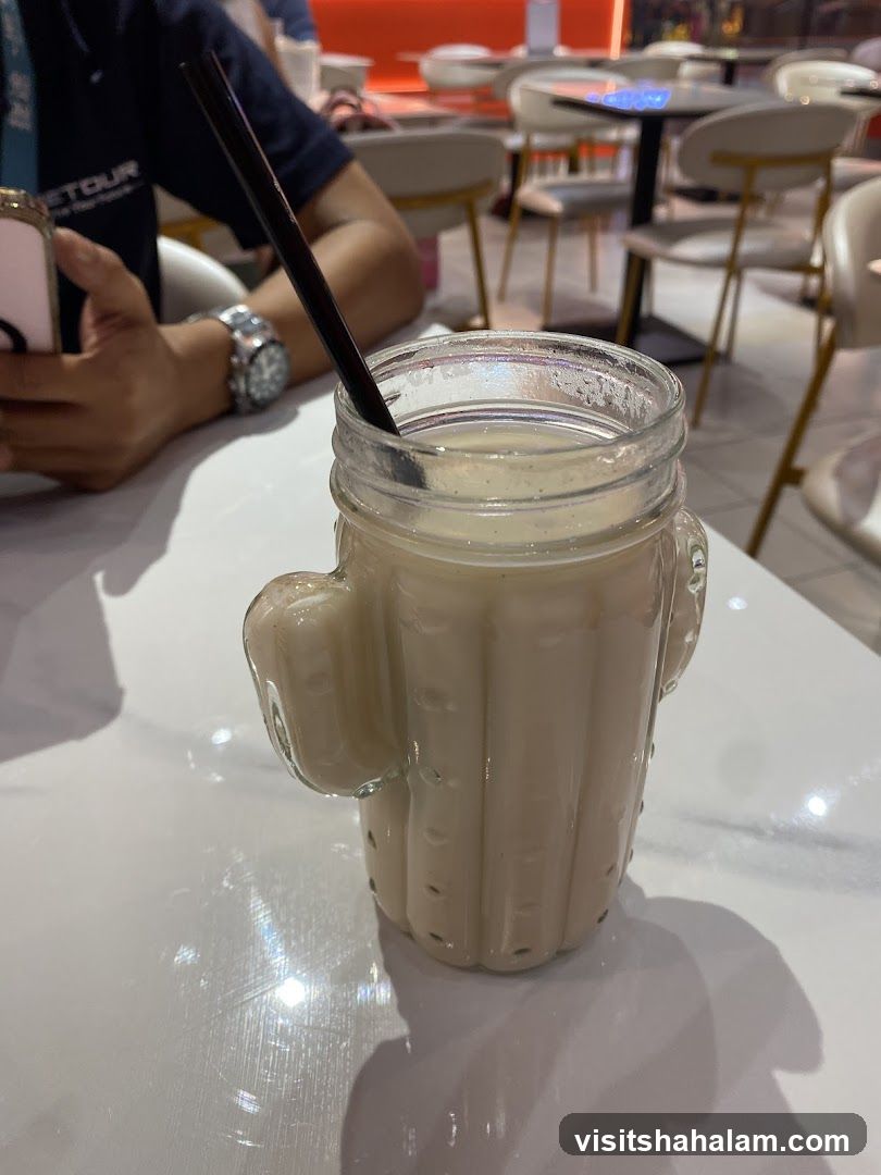 Drink in Cactus-Shaped Glass