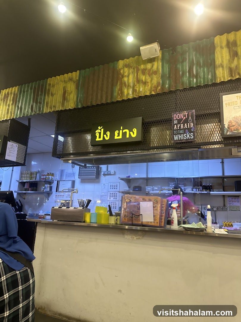 Restaurant Counter with Thai Signage