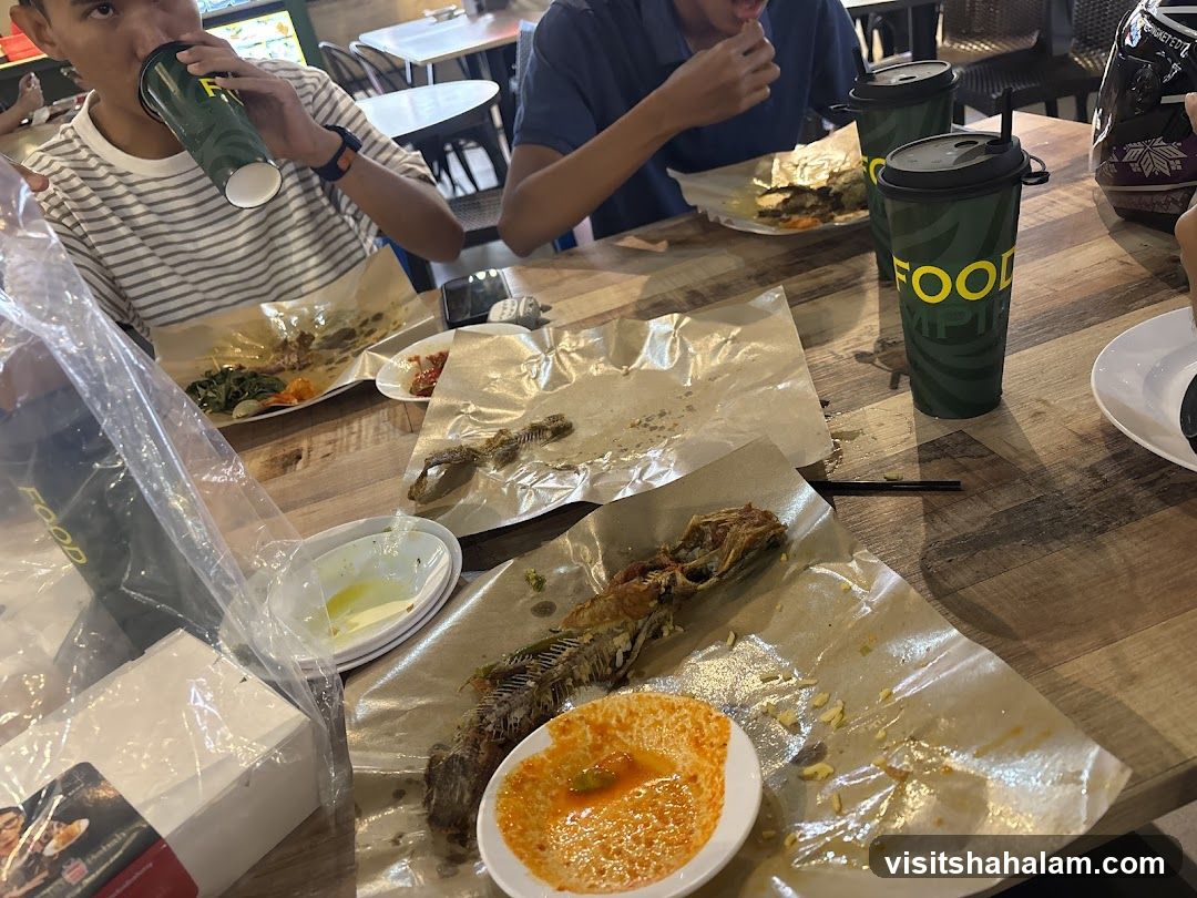 Diners at a table with leftover food