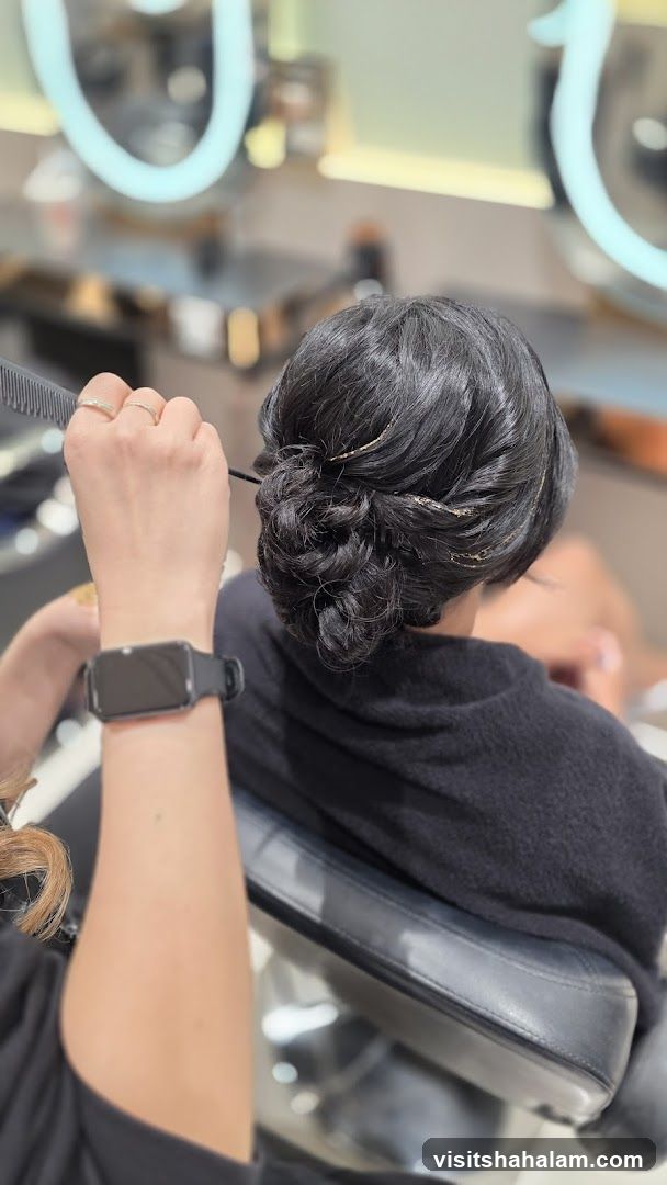Hairdresser styling an updo