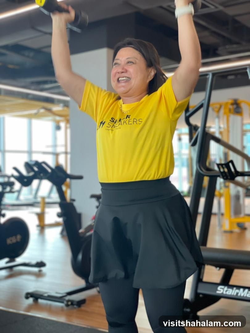 Woman exercising with dumbbells