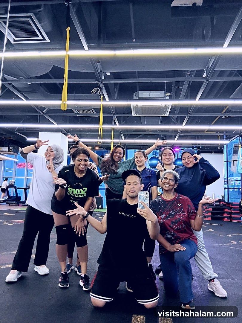 Group posing for a selfie in a gym