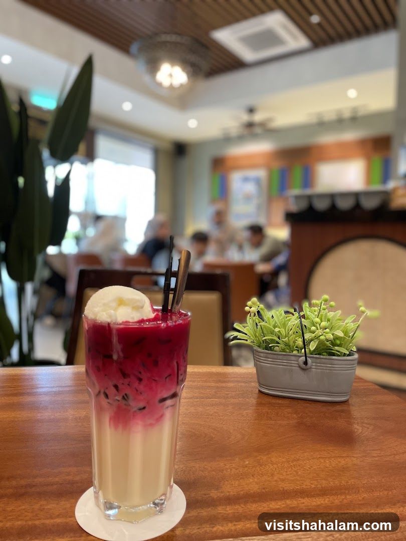 Layered Drink with Ice Cream and Plant Decoration