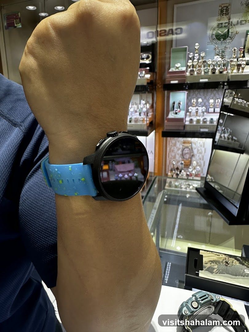 Person wearing a watch in a store