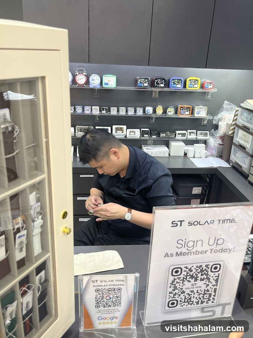 Watch store interior with staff