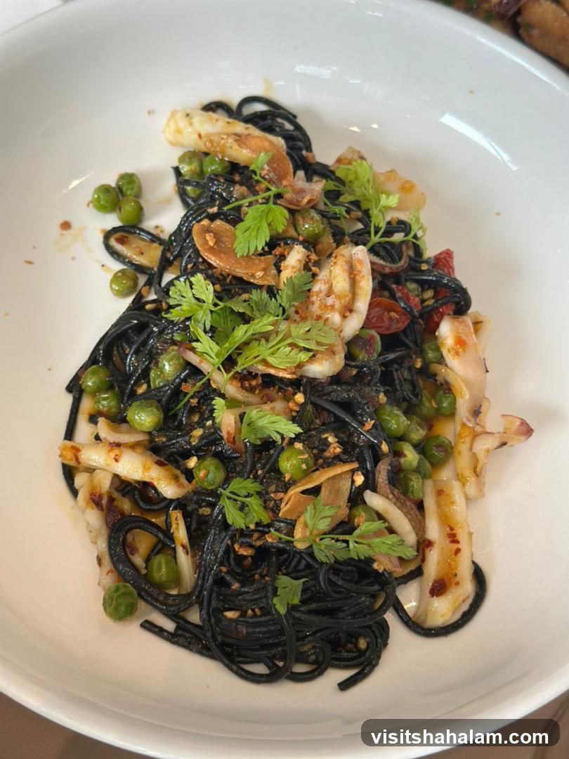 Squid Ink Pasta with Peas and Calamari