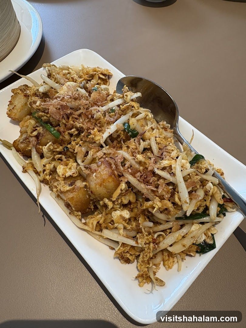 Fried Turnip Cake with Eggs and Bean Sprouts