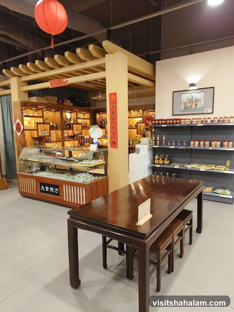 Interior of a shop with display shelves and a table