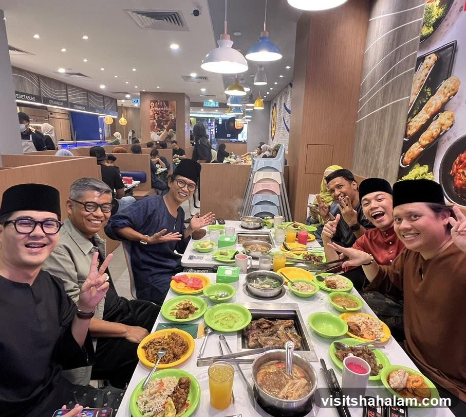 Group of men enjoying a meal at a restaurant