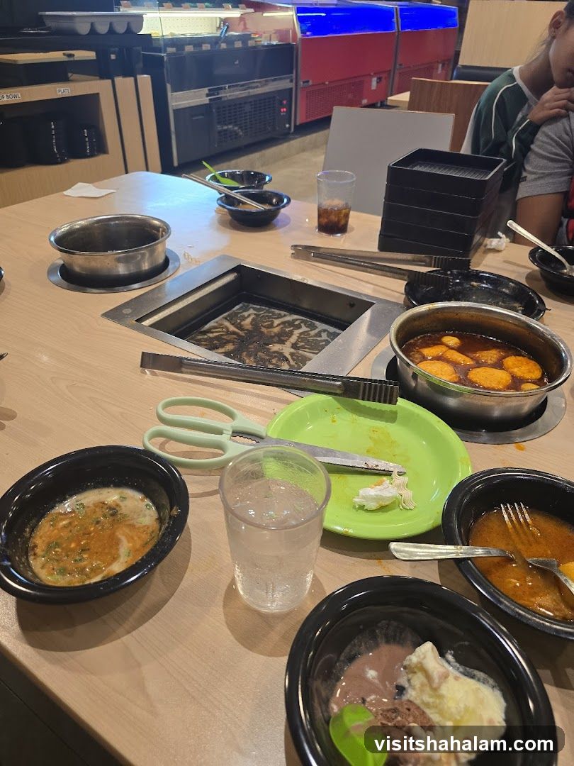 Table with Hot Pot and Desserts
