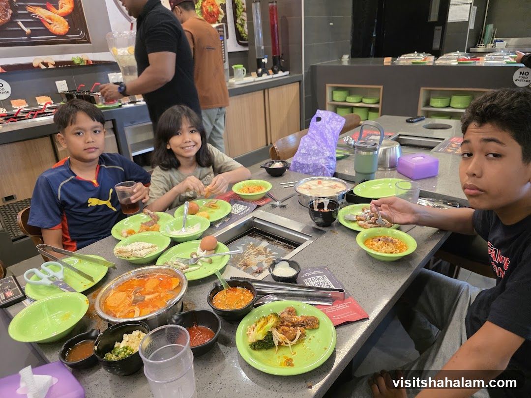 Family enjoying a meal at a buffet