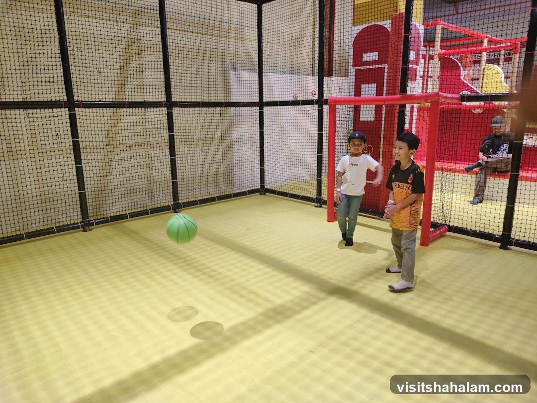 Children Playing Basketball in Indoor Play Area