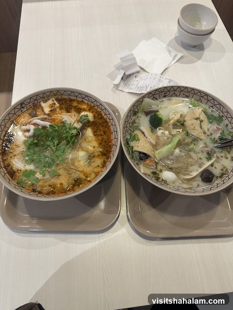 Two bowls of soup on a table