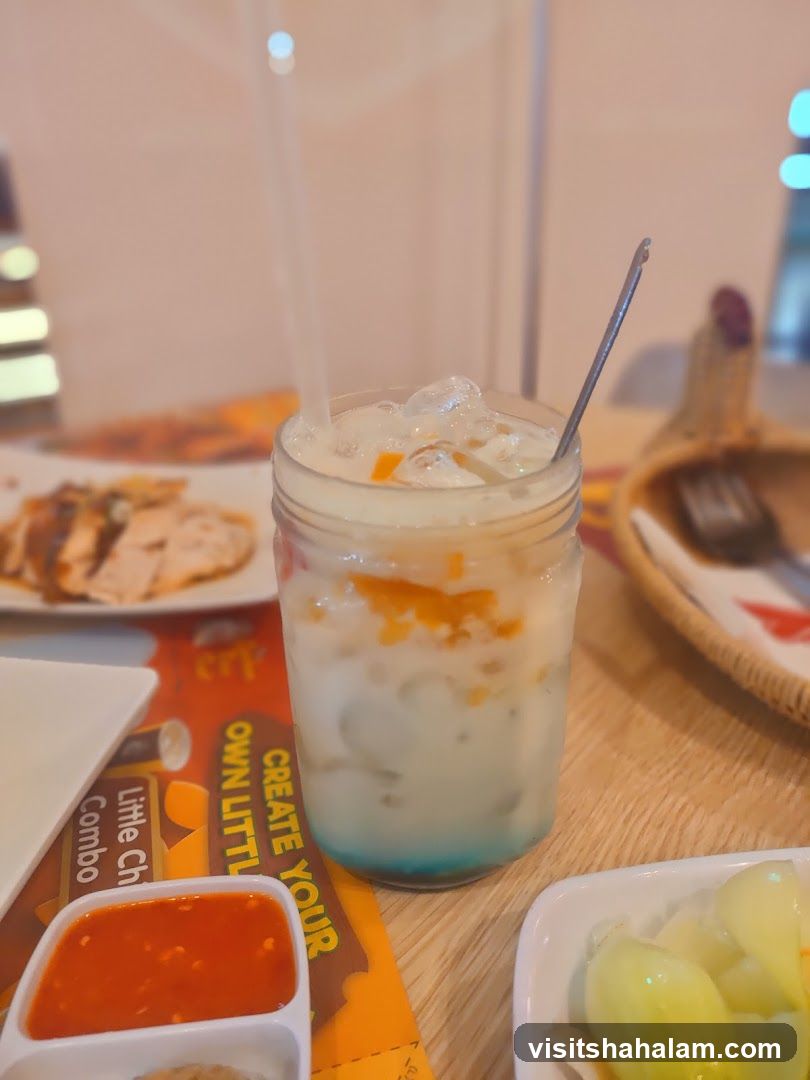 Iced Drink with Orange and Blue Syrup