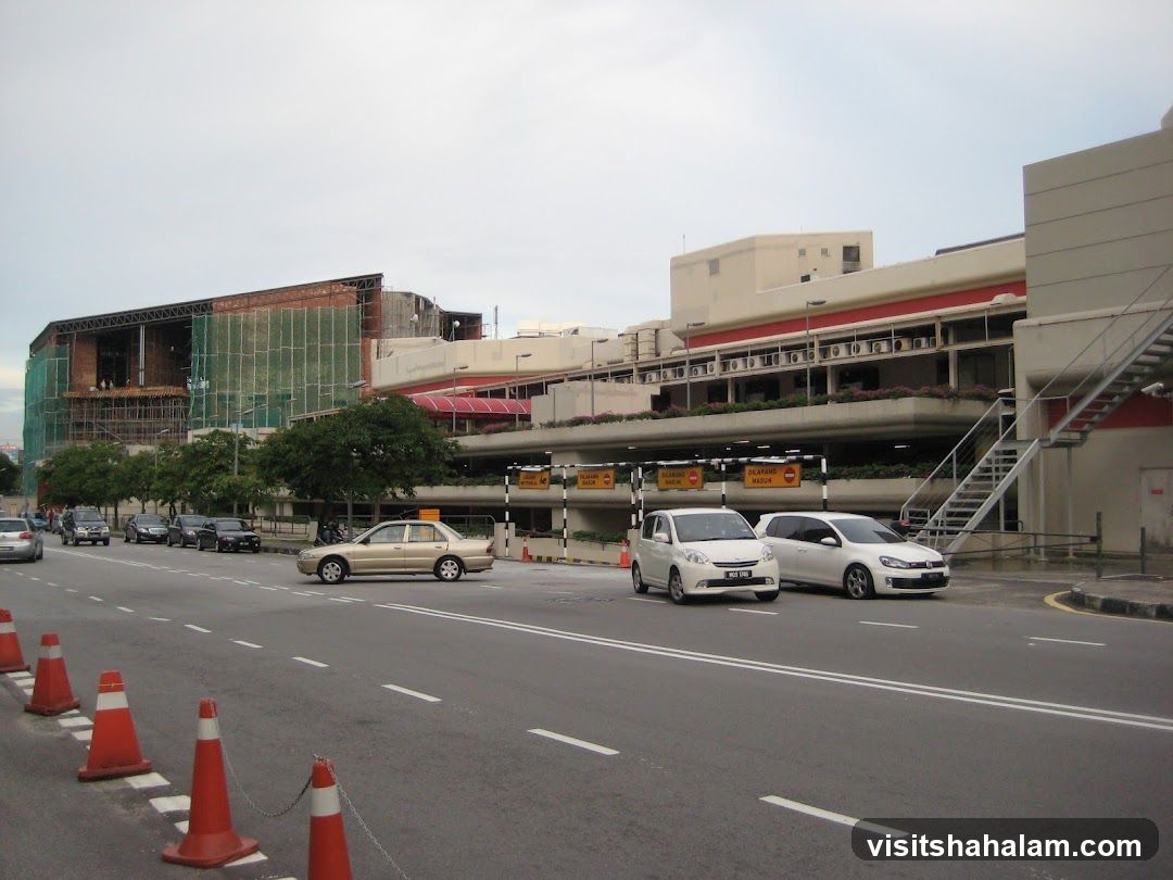 Street View of Building Under Construction and Adjacent Structure