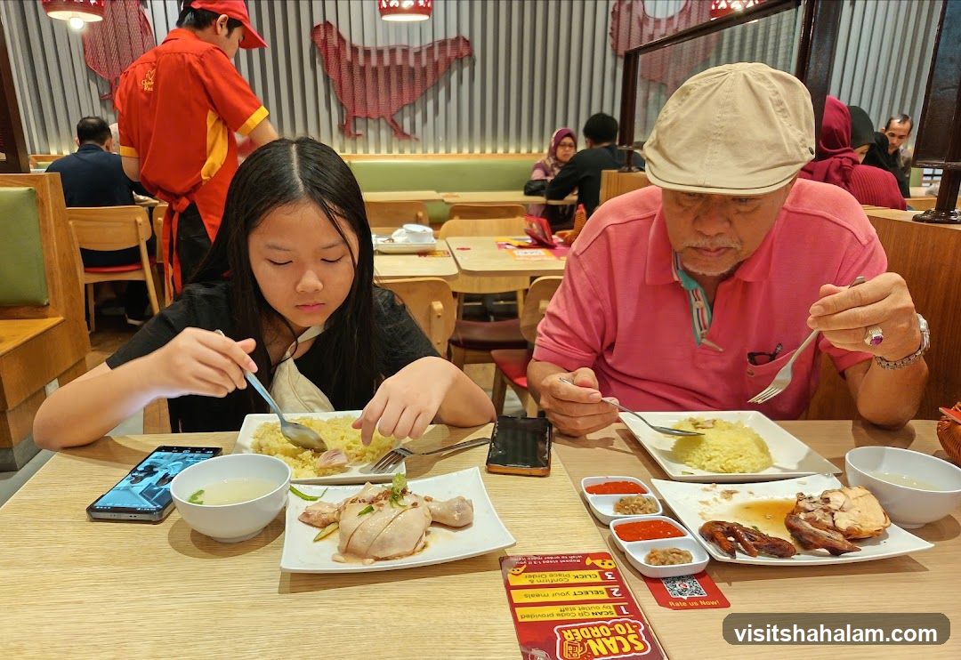 People Eating Chicken Rice