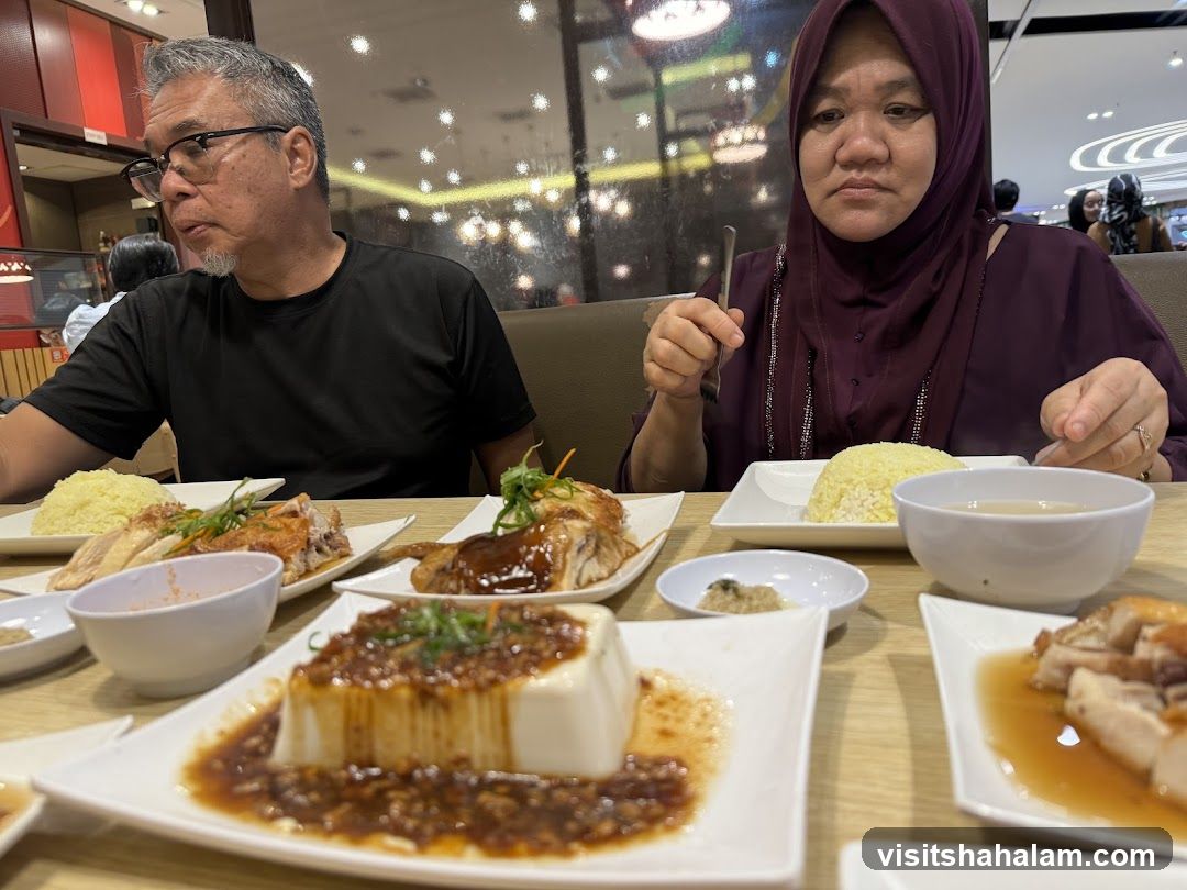 People Eating Chicken Rice