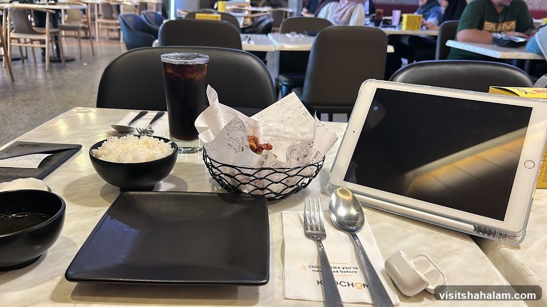 Table Setting with Food and Tablet