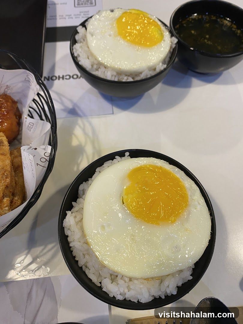 Rice bowls with fried eggs