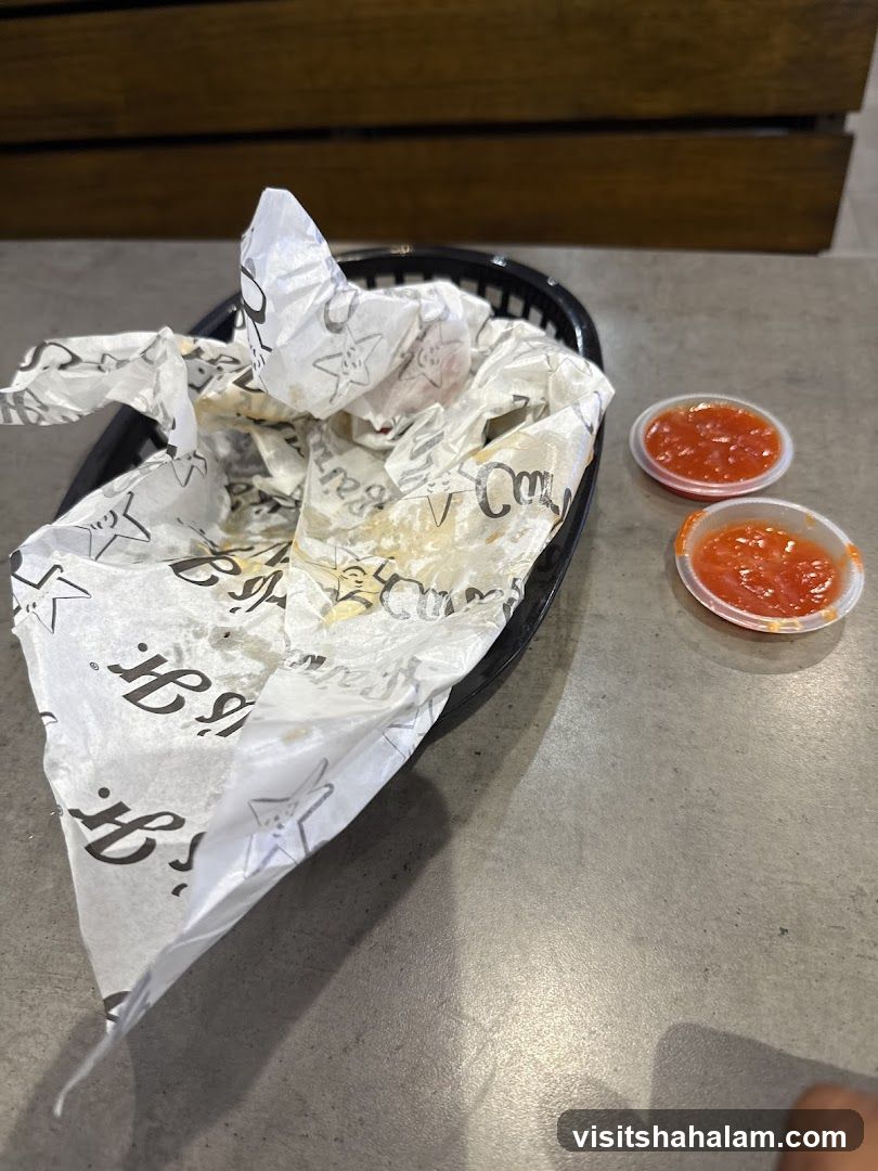 Food basket with wrappers and dipping sauces