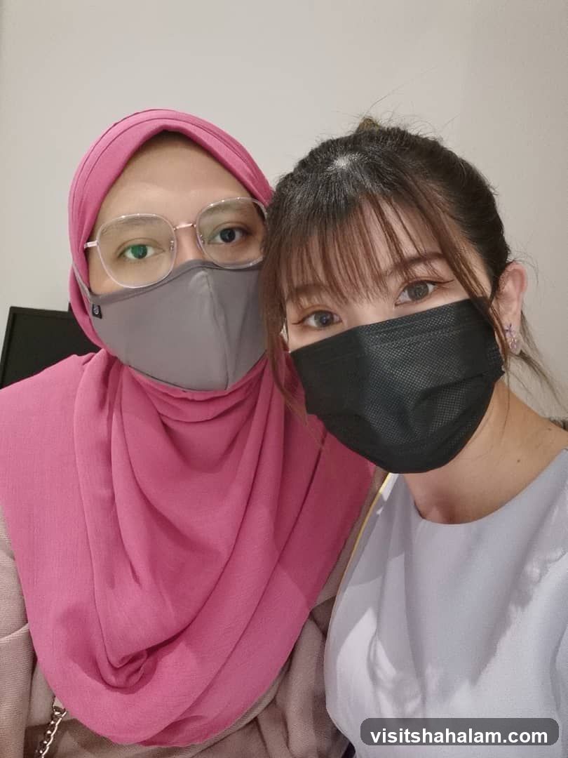 Two women wearing face masks