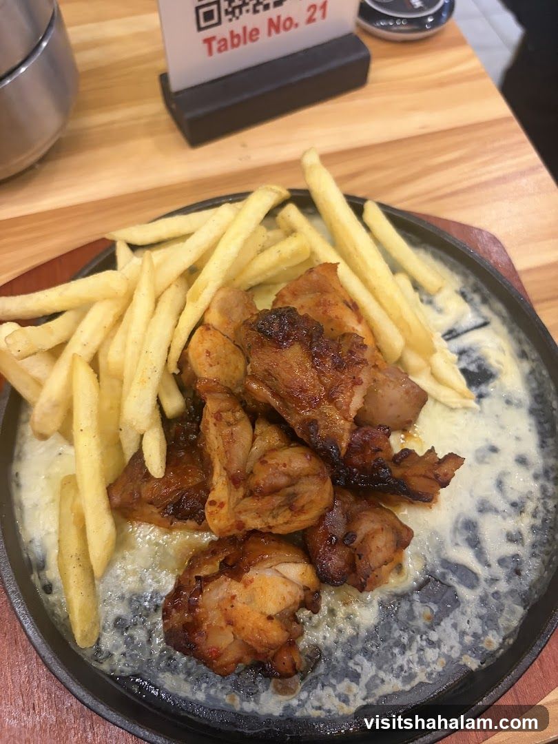Sizzling Chicken and Fries