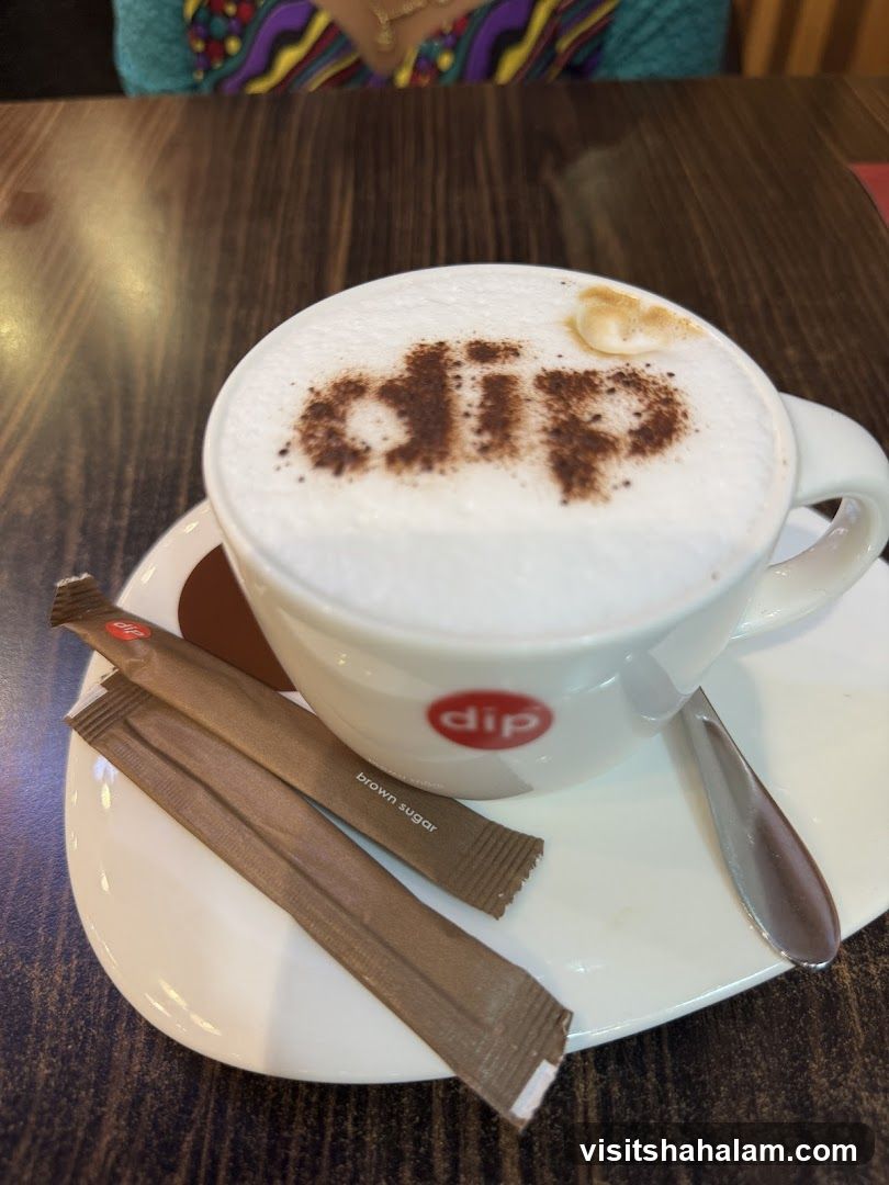Cappuccino with "dip" logo