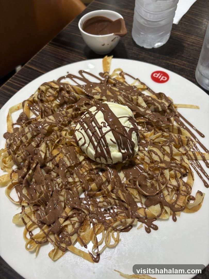 Crepes with Ice Cream and Chocolate Sauce
