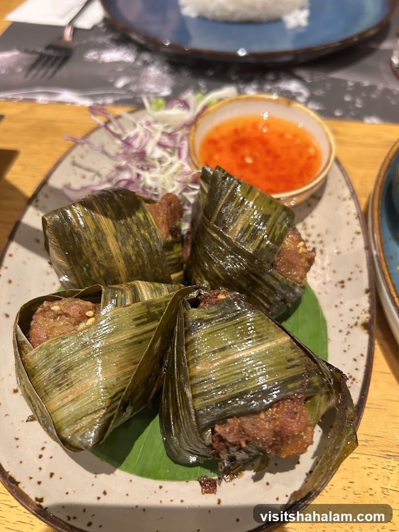 Chicken wrapped in pandan leaves