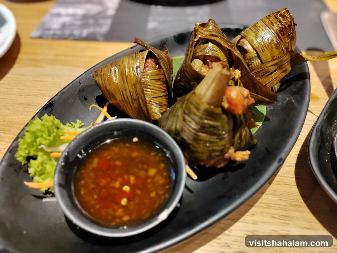 Chicken wrapped in pandan leaves