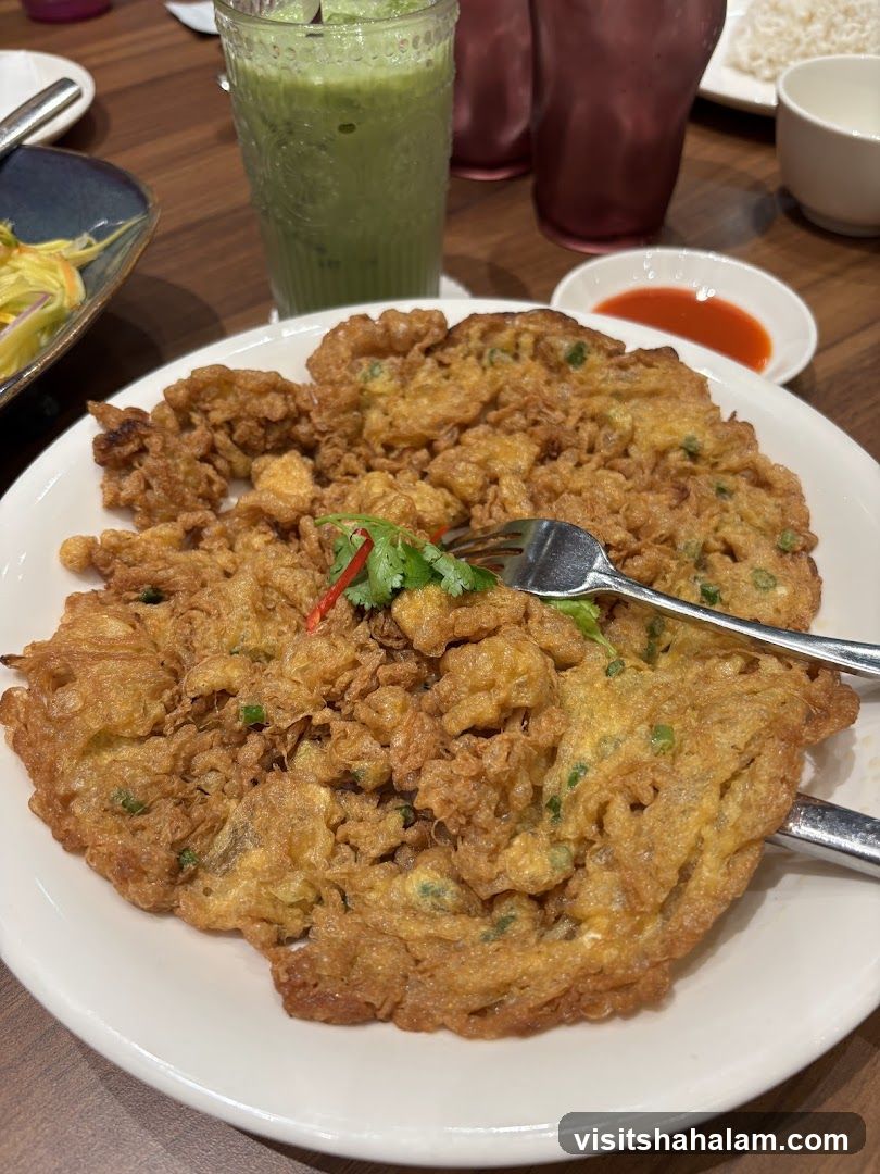 Omelette with dipping sauce and green drink