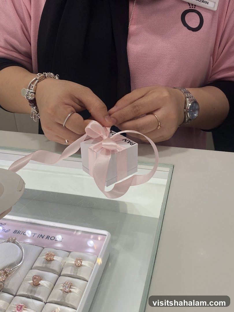 Jewelry Store Employee Wrapping a Gift