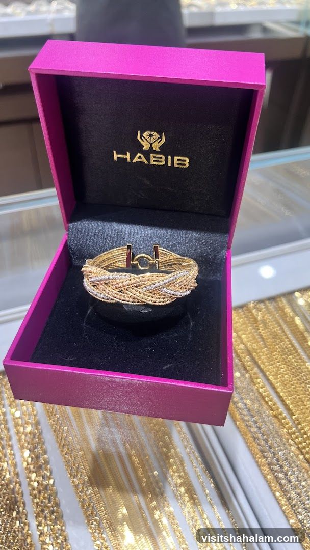 Gold and diamond bracelet in a box