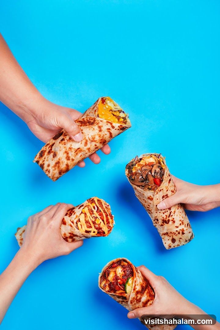 Four Burritos Held by Hands