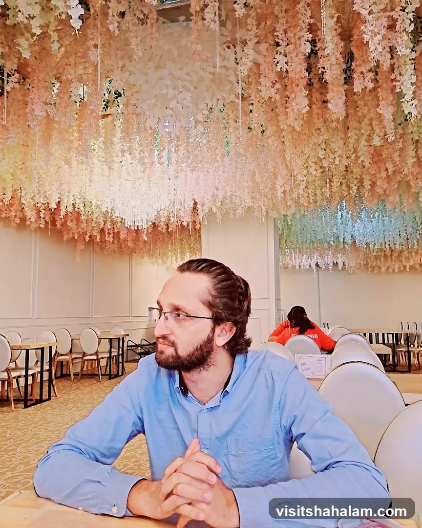 Man sitting at a table in a restaurant