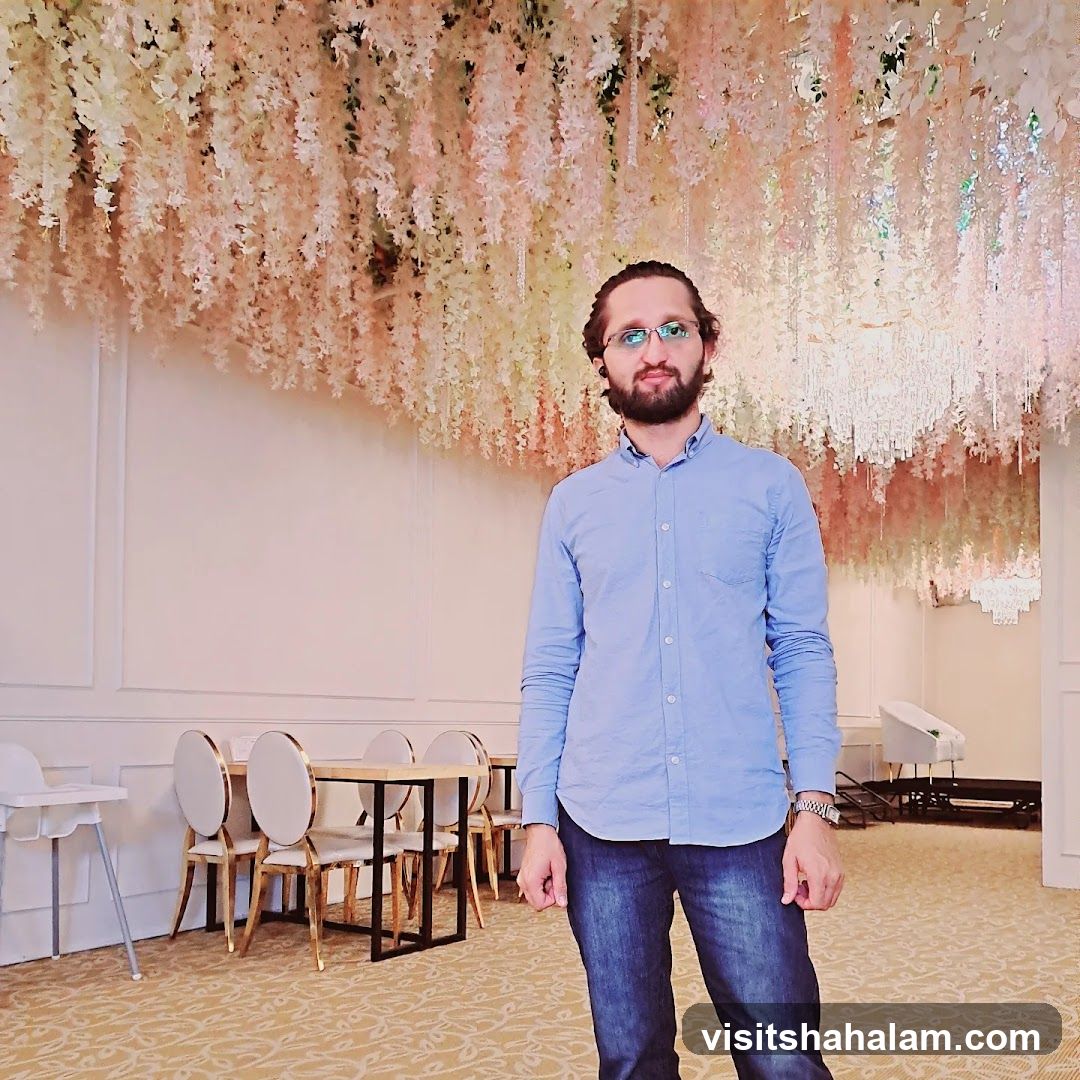 Man Posing in Decorated Room