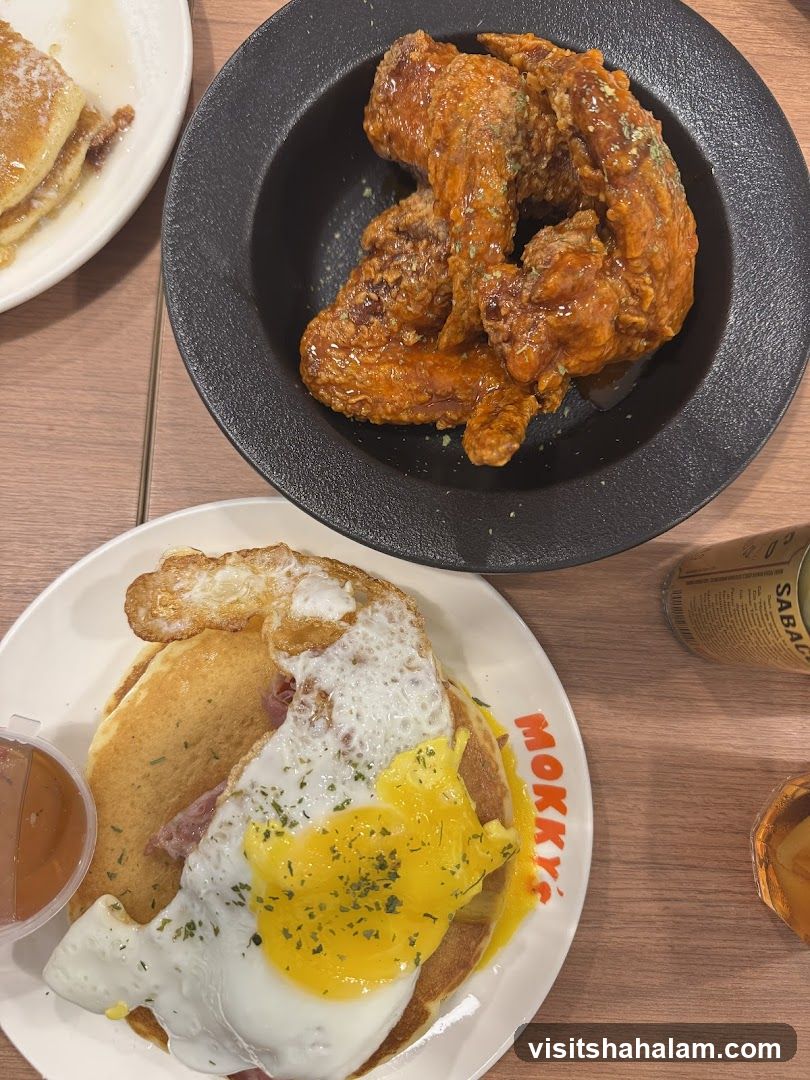 Pancakes with Egg and Bacon and Fried Chicken Wings