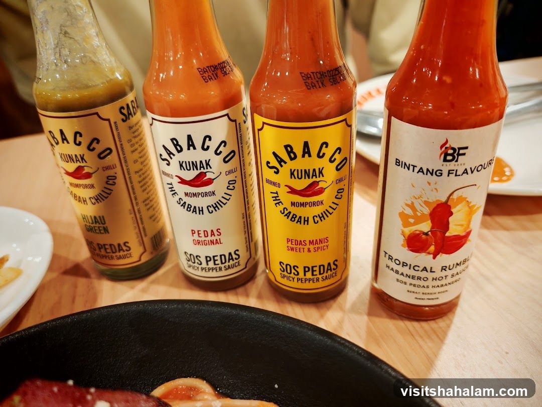 Four Bottles of Hot Sauce