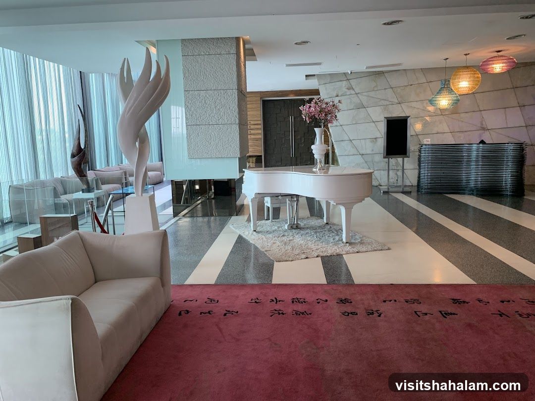 Modern Lobby with Piano and Sculptures